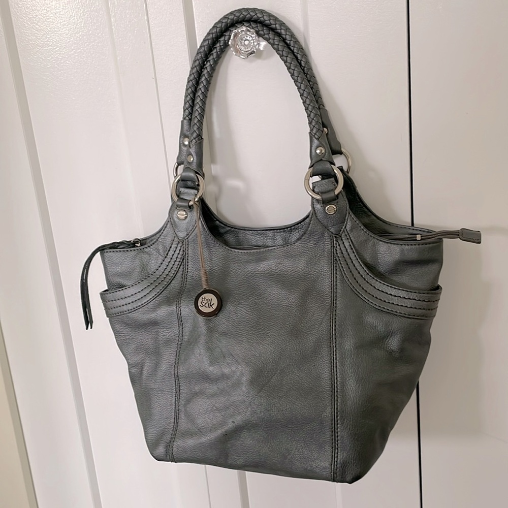 The Sak shoulder bag grey/silver colour. New condition. Braided handles